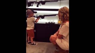 4 YEAR OLD BOY PLAYING WITH GUNS AT NRA  NRA GUN SHOW [upl. by Igig860]