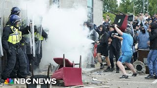 UK farright rioters attack hotel housing asylum seekers [upl. by Gnoix617]