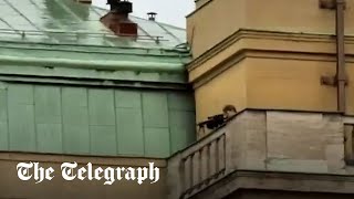 Brave man shouts shoot here you fer in bid to distract Prague shooter from targeting students [upl. by Accebor]