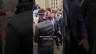 Protester confronts Trudeau ‘You have blood on your hands’ [upl. by Aimaj30]