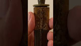 Antique gaucho knife carried so long the point goes through the sheath [upl. by Valora248]