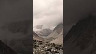 Clouds passing over rocky mountains amazing landscape short [upl. by Ahserkal]