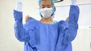 How to Donn Sterile Surgical Gloves amp Gown in Operating Room  Donning Gloves [upl. by Yvehc]