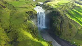 Aerial drone view of Skogafoss waterfall Iceland [upl. by Ymereg]