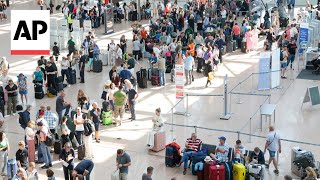 Flights delayed at Berlin airport as widespread technology outage causes disruption around world [upl. by Einwahr982]