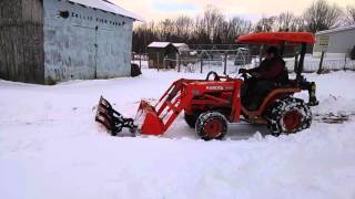 Kubota B1700 with a BOSS UTV 6 Polly snow plow [upl. by Leksehcey25]