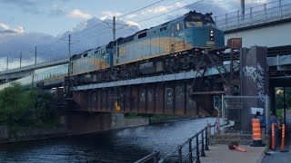 TRAINS Via Rail LRC Coaches and Two F40PH2 Engines Back Up Over Lachine Canal Bridge [upl. by Pippo]