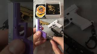 Who like glock keychain with bullets😏😳glockkeychain ematok minigun miniglock [upl. by Ahtera]