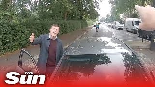 Motorist drives into vigilante cyclist as he stops driver on wrong side of road [upl. by Allerie]