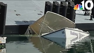 Crane drops barge onto boat in East Boston marina [upl. by Attelocin]