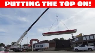 Using a crane to install a fuel island canopy in one piece [upl. by Nevile]