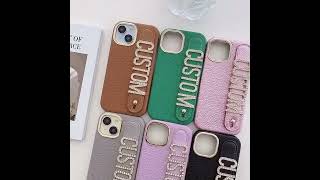 Personalized PU hardware camera litchi pattern diamond letter wristband stand mobile phone case [upl. by Fitzhugh]