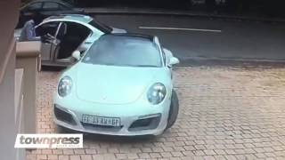 Smart Porsche driver escapes hijackers in Johannesburg [upl. by Pernas]