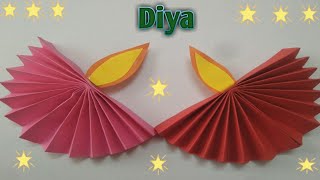 How to make Fan Folding Diya with paper [upl. by Ahsaele]