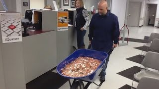 Man Pays Nearly 3000 Bill Using A Wheelbarrow Full Of Pennies [upl. by Nilesoj]