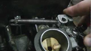 How a Briggs and Stratton Push Mower engine governorthrottle linkage is set up and how it works [upl. by Idak]