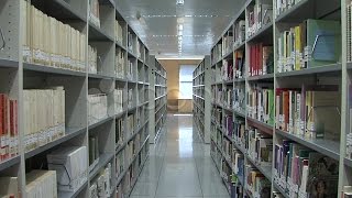 Long Library Bookcases Stock Footage [upl. by Alithia]