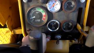 Starting and Driving a John Deere 450C Bulldozer [upl. by Jaunita239]