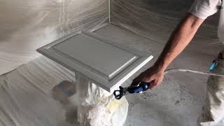 How to spray cabinet doors with an airless sprayer FFLP 312 tip Sherwin Williams Pro Classic Hybrid [upl. by Eet685]