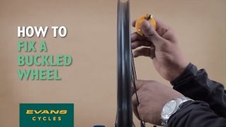 How to fix a buckled wheel [upl. by Weiner]