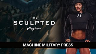 The Sculpted Vegan Exercise Tutorial Machine Military Press [upl. by Areikahs]