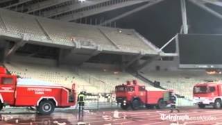 Greek football fans set stands alight at derby [upl. by Suki671]