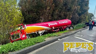 Fuel tanker swerves off freeway  lands down embankment [upl. by Lemaj54]