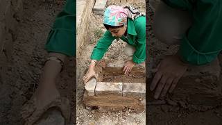 Building a stove with bricks and mudstraw mix [upl. by Wilkison]