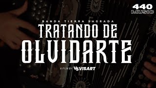 Banda Tierra Sagrada   TRATANDO DE OLVIDARTE  Video Oficial [upl. by Attegroeg746]