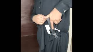 Weaponology drawing and reholstering a pistol from a kydex holster from shalwar kameez shorts [upl. by Nestor]