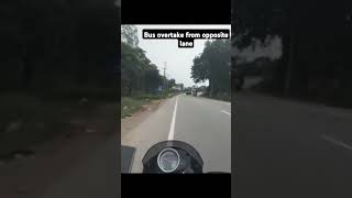 Bus overtake from opposite lane biker busovertake traffic [upl. by Nosrej414]