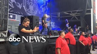 Sign language interpreter rocks out at heavy metal concert [upl. by Previdi]