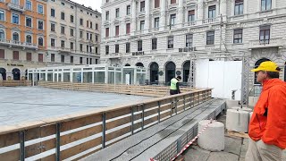 La preparazione della pista di pattinaggio su ghiaccio in piazza Ponterosso a Trieste [upl. by Aerahs22]