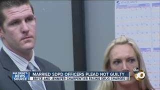 SDPD officers Bryce and Jennifer Charpentier plead not guilty in drug case [upl. by Manolo]