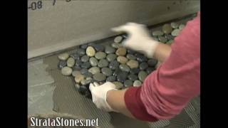 Pebble Tile Shower Installation on DIY Network [upl. by Eisteb]