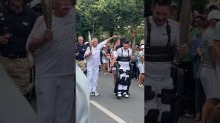 Paraathlete walks with Olympic torch thanks to exoskeleton  Humankind shorts olympics [upl. by Enehpets453]