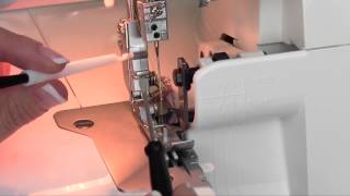 Bernina 700D Serger 11 Changing Needles [upl. by Buller]