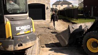 Paver Driveway Installation  Big jobs big equipment big results [upl. by Saucy]