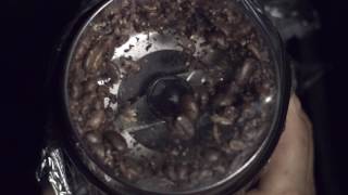 Coffee beans ground up in slow motion [upl. by Bravin]