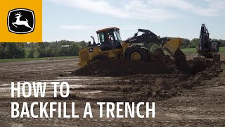 How to Backfill a Trench  John Deere Wheel Loaders [upl. by Corron]