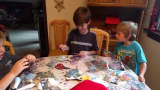 Kids opening up Pokemon cards [upl. by Enelyar572]