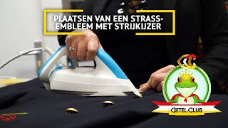 Strasembleem plaatsen met een strijkijzer op uniformjasje Oetelclubnl [upl. by Patience267]