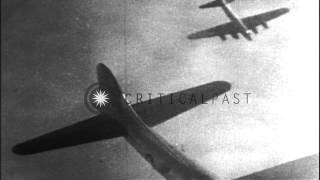 A burning American B17 aircraft falls through clouds in Germany HD Stock Footage [upl. by Kendy601]