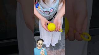 Fun Review on Outdoor Portable Raincoat Ball Disposable Rainwear Keychain [upl. by Feodor976]