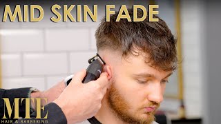 Mid Skin Fade Tutorial  Barbering [upl. by Lovato21]