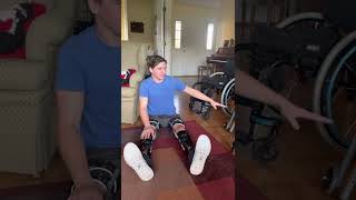 Paraplegic putting on KAFO leg braces [upl. by Kcirdahs]