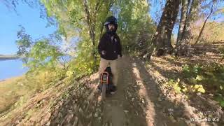 Electric unicycle Inmotion v13 riding through the woods [upl. by Xirdnek190]