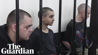 UK officials condemn Russian show trial that sentenced two Britons to death [upl. by Ahsilef931]