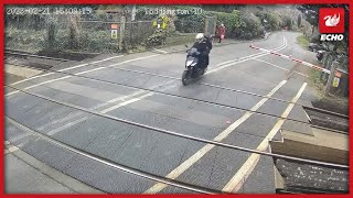 Moped narrowly avoids 70mph train at level crossing [upl. by Origra]