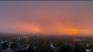 Onlookers amazed as lightning flashes during sunset in Salt Lake City [upl. by Aniuqaoj675]